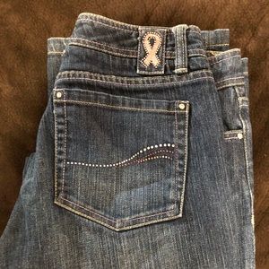 WHBM jeans honoring With Breast Cancer symbol.